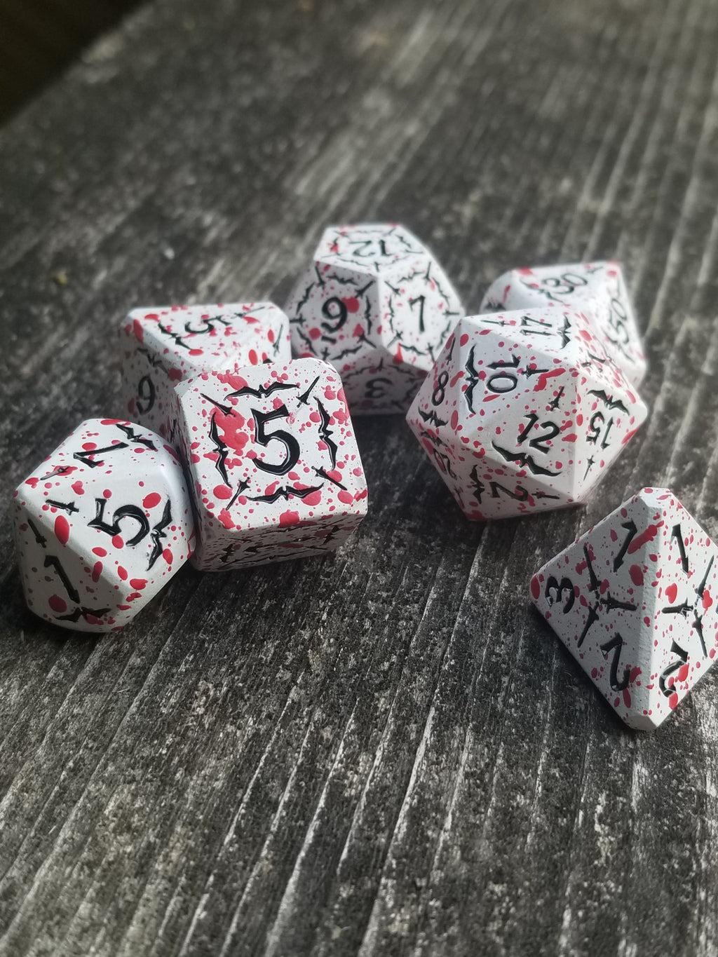 Battle Hardened Dice: White metal dice w/Black numbering and Red Splatter 7- Dice Set Rpg