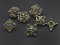 White w/Gold Deadly Skull Dice Hollow Metal 7-Dice Set